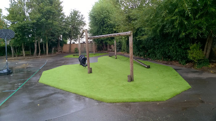 Wet Pour Artificial Grass Overlay - Artificial Grass Sports Area London Surrey Hampshire Sussex Hardwood Play Equipment, Play Equipment Manufacturer, Play Area Specialist, Safety Surfacing 