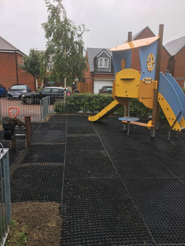 Trinity Homes Hayling Island - Grass Matt Surfacing - Independent Playground Safety Surfacing Installer West Sussex Surrey Hampshire